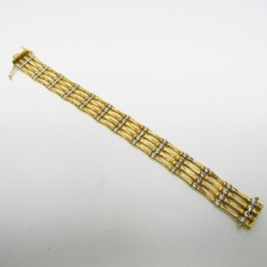 Pulsera Articulada en Oro Amarillo y Blanco de 18k. 27,80 gr.