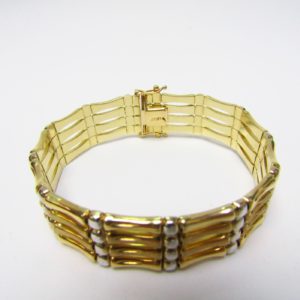Pulsera Articulada en Oro Amarillo y Blanco de 18k. 27,80 gr.