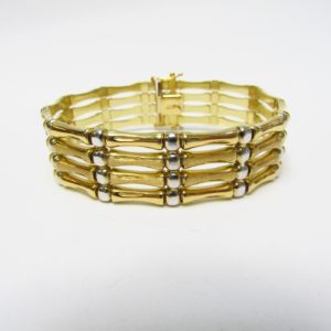 Pulsera Articulada en Oro Amarillo y Blanco de 18k. 27,80 gr.