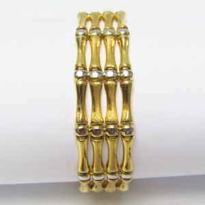 Pulsera Articulada en Oro Amarillo y Blanco de 18k. 27,80 gr.