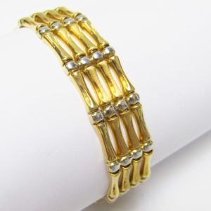 Pulsera Articulada en Oro Amarillo y Blanco de 18k. 27,80 gr.