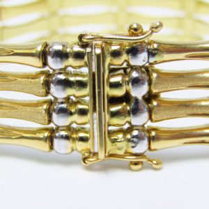 Pulsera Articulada en Oro Amarillo y Blanco de 18k. 27,80 gr.