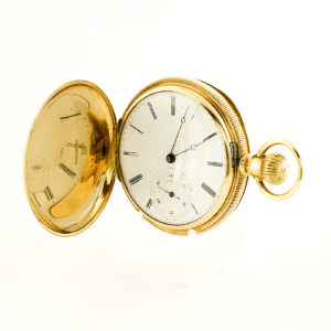 Dueber. Reloj de bolsillo, de caballero y colgar, saboneta, remontoir. Oro 14k.