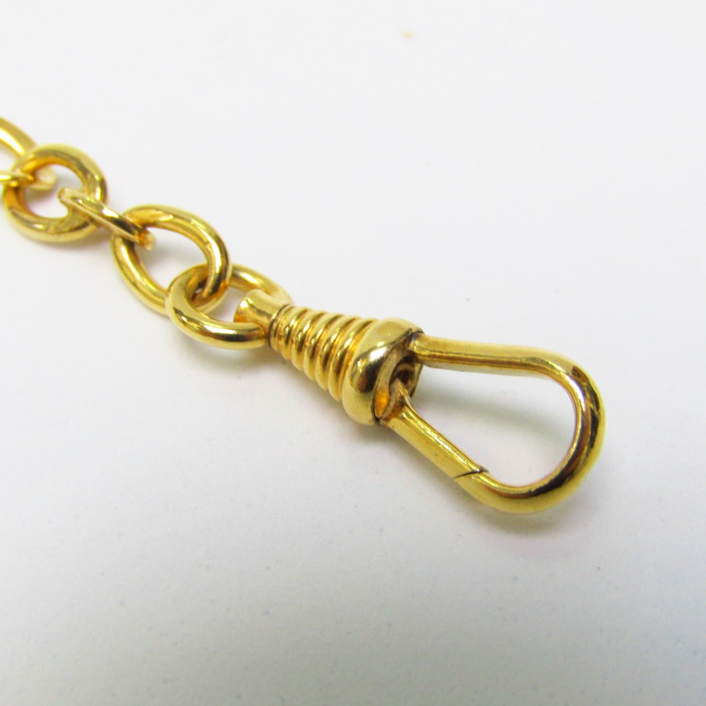 Leontina antigua. Terminal cadena para reloj de bolsillo. Oro 14k. Peso: 18,90 gr. Leontina antigua. Terminal cadena para reloj de bolsillo. Oro 14k. Peso: 18,90 gr.