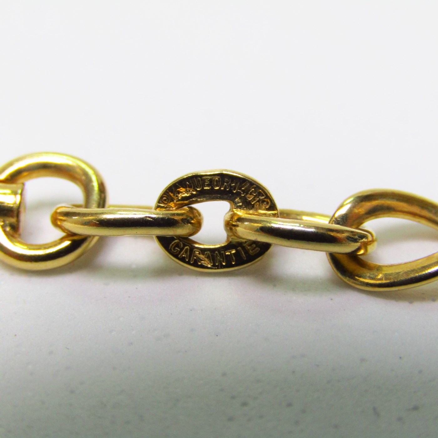 Leontina antigua. Terminal cadena para reloj de bolsillo. Oro 14k. Peso: 18,90 gr. Leontina antigua. Terminal cadena para reloj de bolsillo. Oro 14k. Peso: 18,90 gr.
