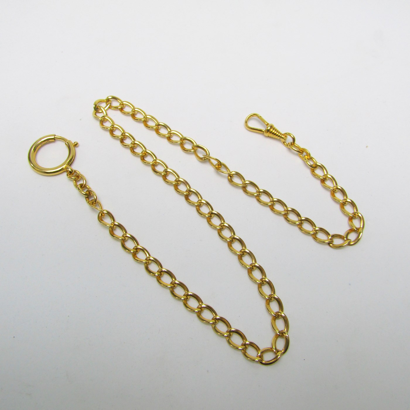 Leontina antigua. Terminal cadena para reloj de bolsillo. Oro 14k. Peso: 18,90 gr. Leontina antigua. Terminal cadena para reloj de bolsillo. Oro 14k. Peso: 18,90 gr.