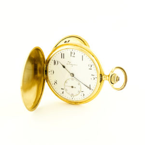 Longines. Reloj de Bolsillo para caballero, saboneta y remontoir. Año 1910. Oro 18k.