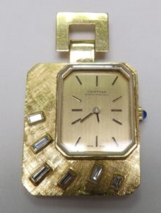 Certina. Kurth Fréres. reloj de colgar para mujer en oro y diamantes. Ca. 1960.