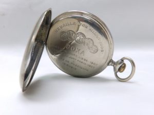 DOXA. Reloj erótico de bolsillo. AUTOMATÓN. Año 1906.