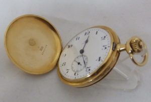 Omega. Reloj de Bolsillo saboneta. Circa, 1912. Oro 18k.
