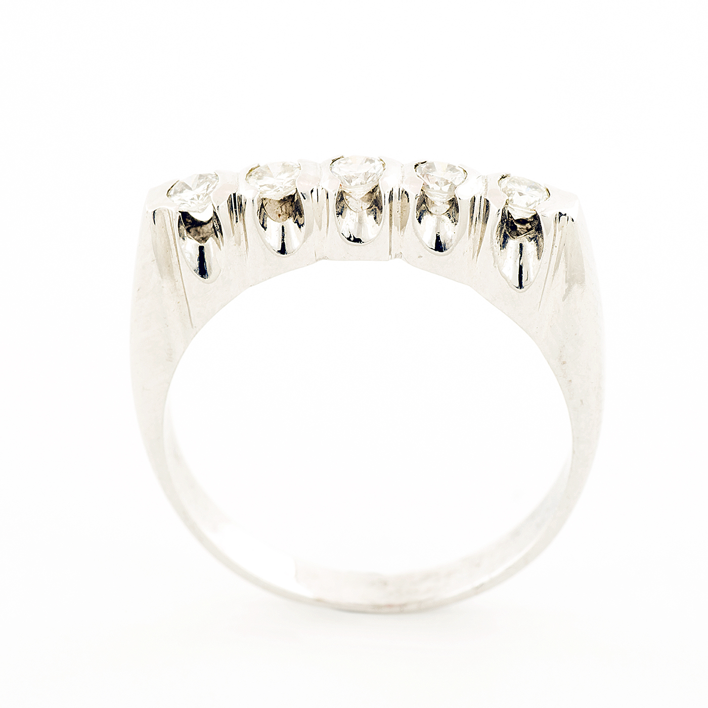 Quintillo en Platino, con Diamantes talla Brillante de 0,25 ct. total. (G-H/VS2-SI1). 4,62 gr. Quintillo en Platino, con Diamantes talla Brillante de 0,25 ct. total. (G-H/VS2-SI1). 4,62 gr.