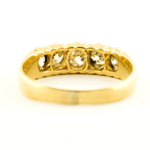 Sortija Quintillo en Oro amarillo de 18k con cinco Diamantes Naturales talla Brillante con 1,13 ct. total.