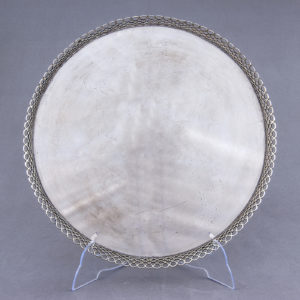Conjunto formado por Bandeja circular, jarra y seis copas en Plata de Ley. España-Portugal, siglo XX.