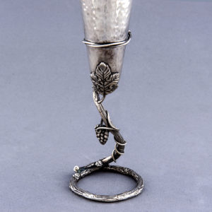 Conjunto formado por Bandeja circular, jarra y seis copas en Plata de Ley. España-Portugal, siglo XX.