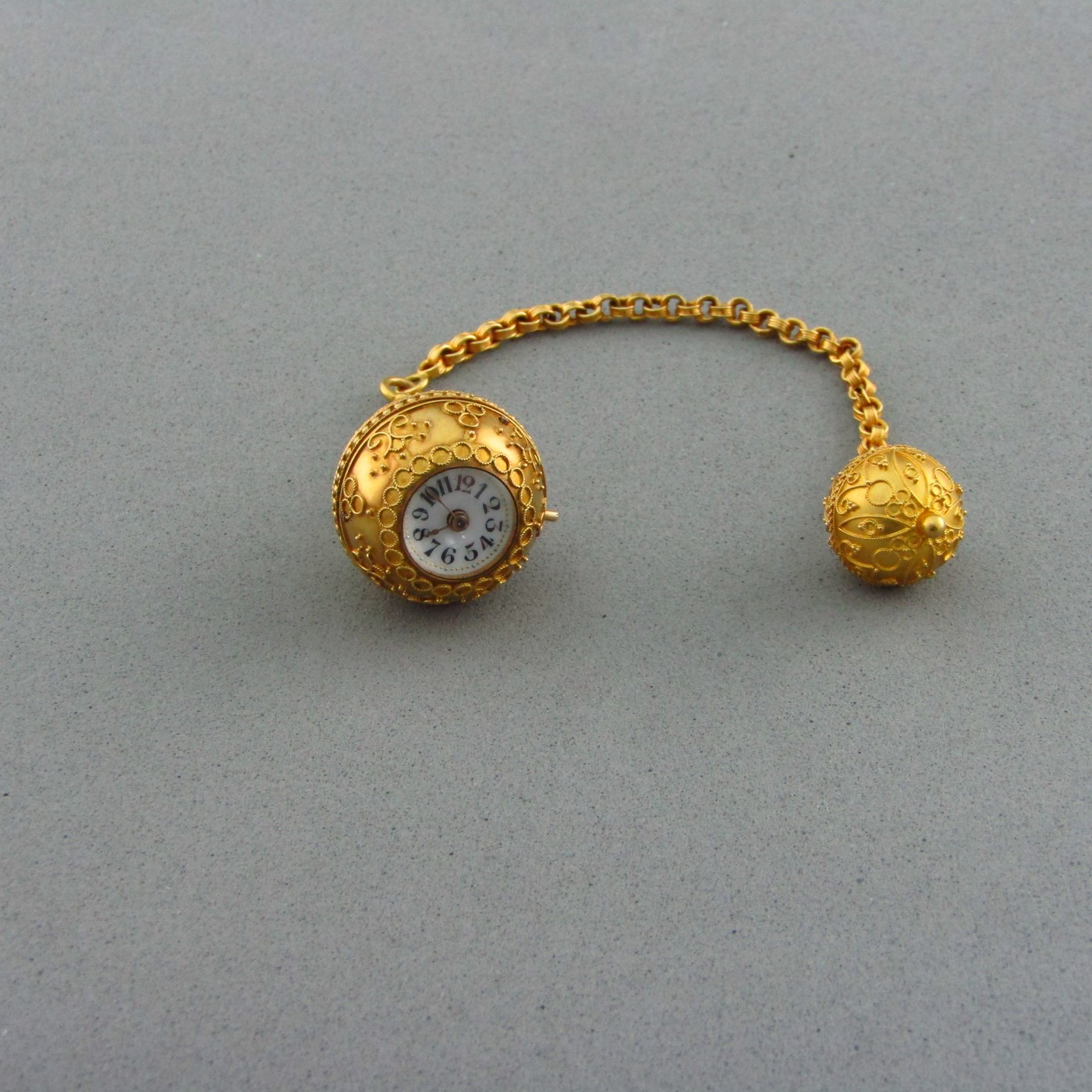 Leontina y Reloj de Bolsillo para dama en Oro de 18k. Ca. Leontina y Reloj de Bolsillo para dama en Oro de 18k. Ca.