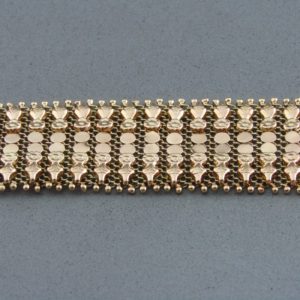 Pulsera ancha en Oro de 18k con flecos. 58 gr.