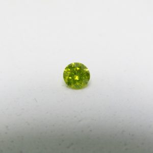 Diamante Natural de 0,30 ct. Talla: Brillante. Color: Fancy Yellow. Pureza: P2. Sin datos de tratamiento.
