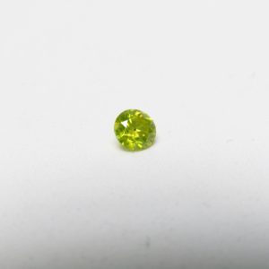 Diamante Natural de 0,30 ct. Talla: Brillante. Color: Fancy Yellow. Pureza: P2. Sin datos de tratamiento.