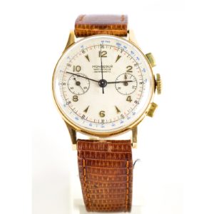 Monsegur. Reloj Cronógrafo de pulsera para caballero. Oro 18k. Ca. 1950