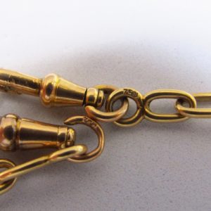 Leontina antigua. Terminal cadena para reloj de bolsillo. Oro 18k.