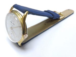 LIGA. Reloj de pulsera, Calendario, Movimiento complejo, para caballero. Ca. 1950.