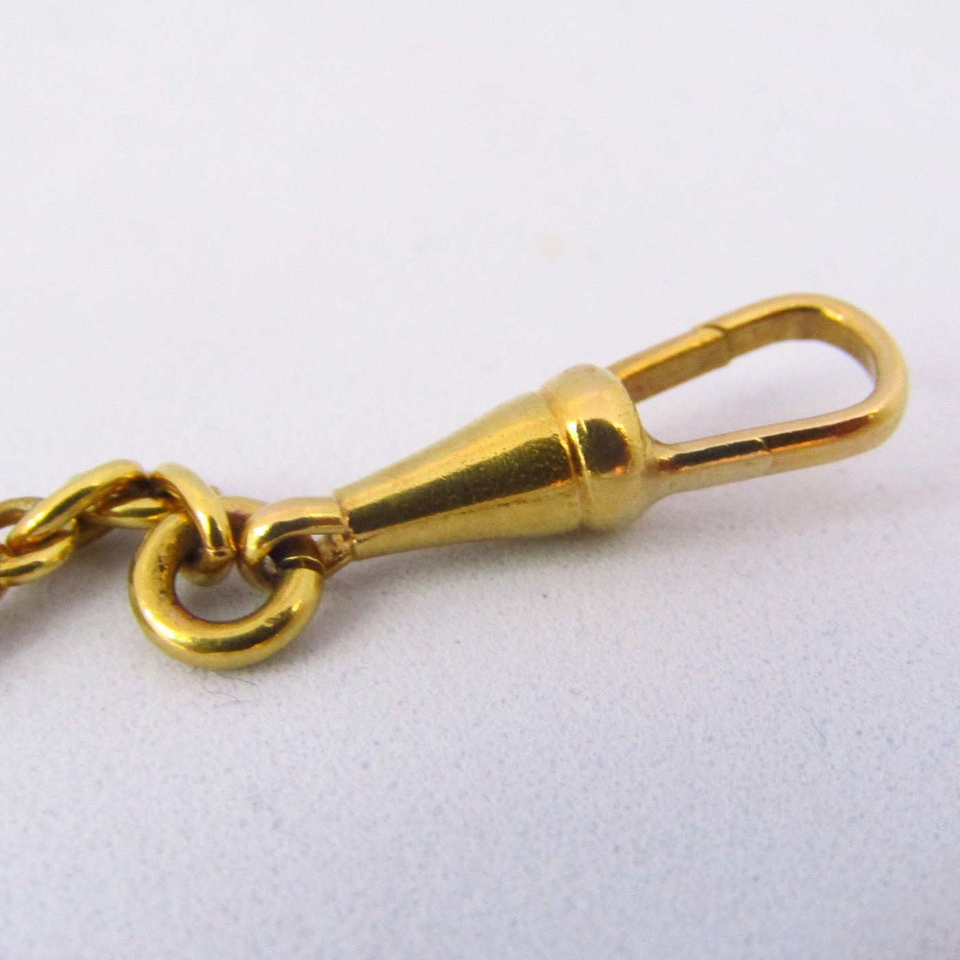Leontina antigua. Terminal cadena para reloj de bolsillo. Oro 18k. 10,78 gr. Leontina antigua. Terminal cadena para reloj de bolsillo. Oro 18k. 10,78 gr.