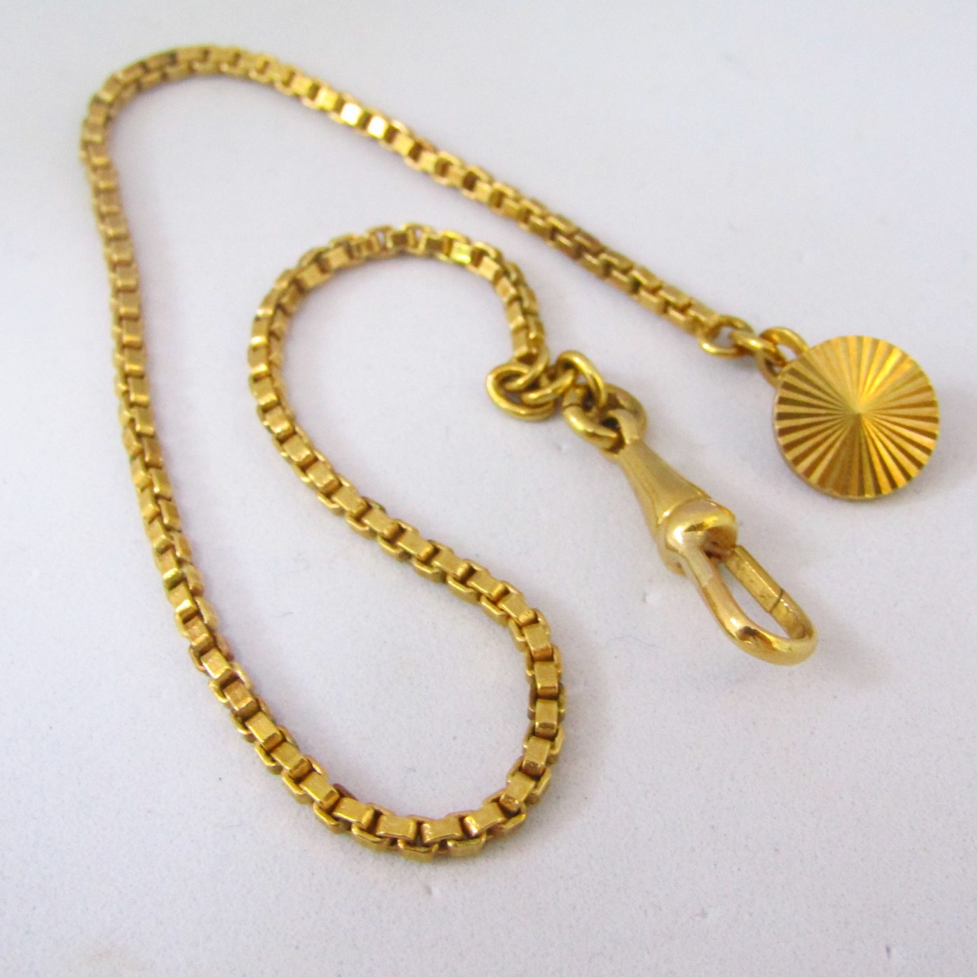 Leontina antigua. Terminal cadena para reloj de bolsillo. Oro 18k. 10,78 gr. Leontina antigua. Terminal cadena para reloj de bolsillo. Oro 18k. 10,78 gr.
