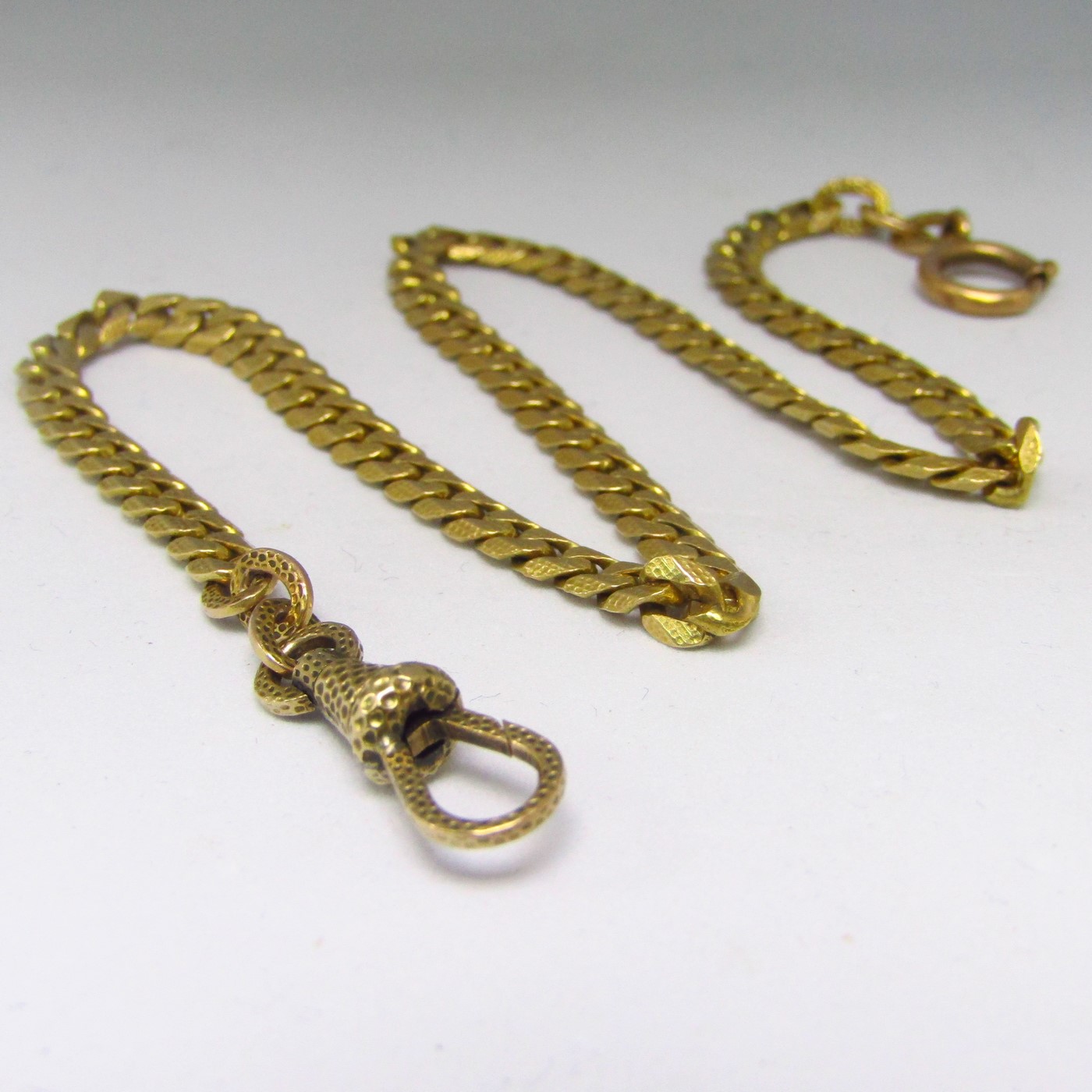 Leontina antigua. Terminal cadena para reloj de bolsillo. Oro 18k. 19,72 gr. Leontina antigua. Terminal cadena para reloj de bolsillo. Oro 18k. 19,72 gr.