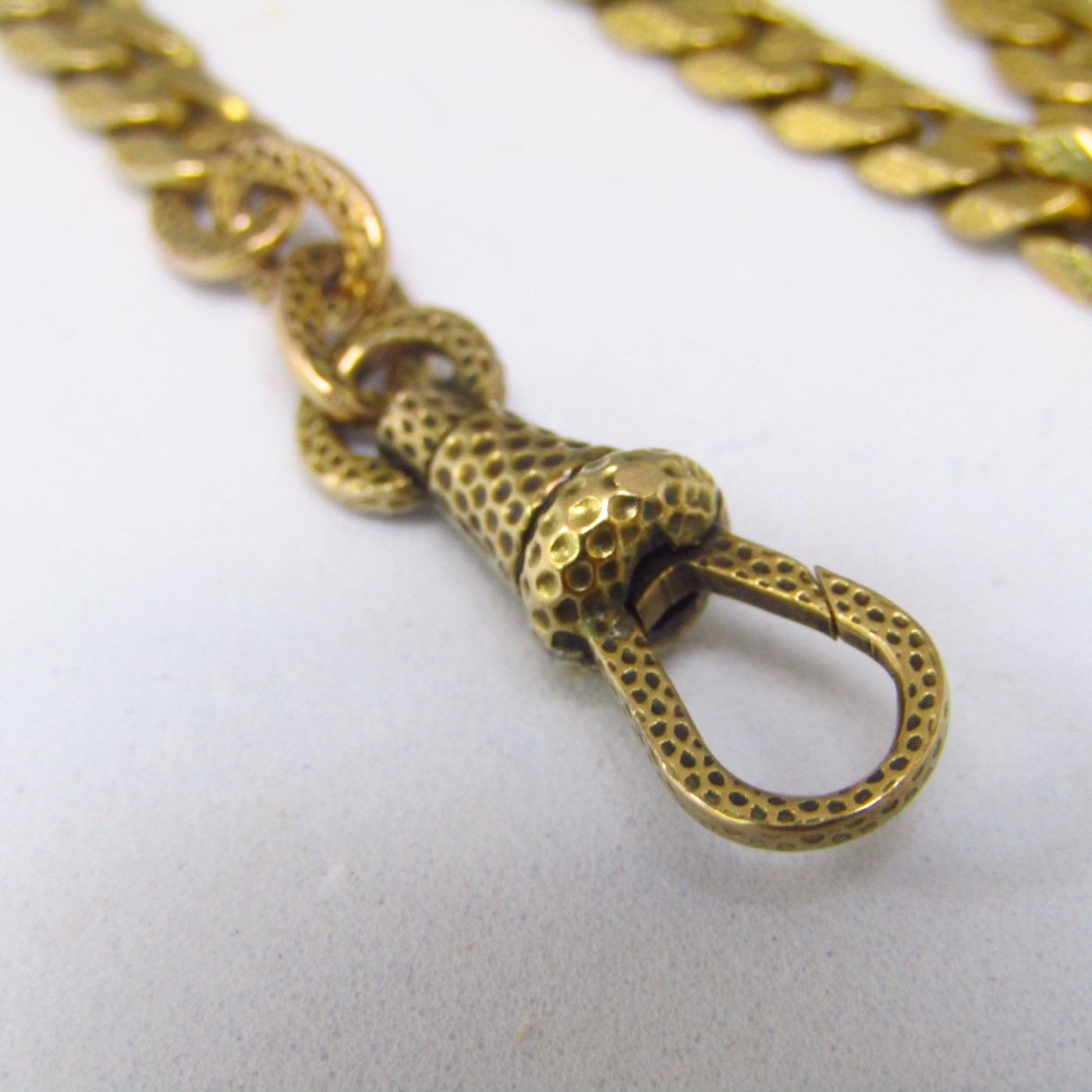 Leontina antigua. Terminal cadena para reloj de bolsillo. Oro 18k. 19,72 gr. Leontina antigua. Terminal cadena para reloj de bolsillo. Oro 18k. 19,72 gr.