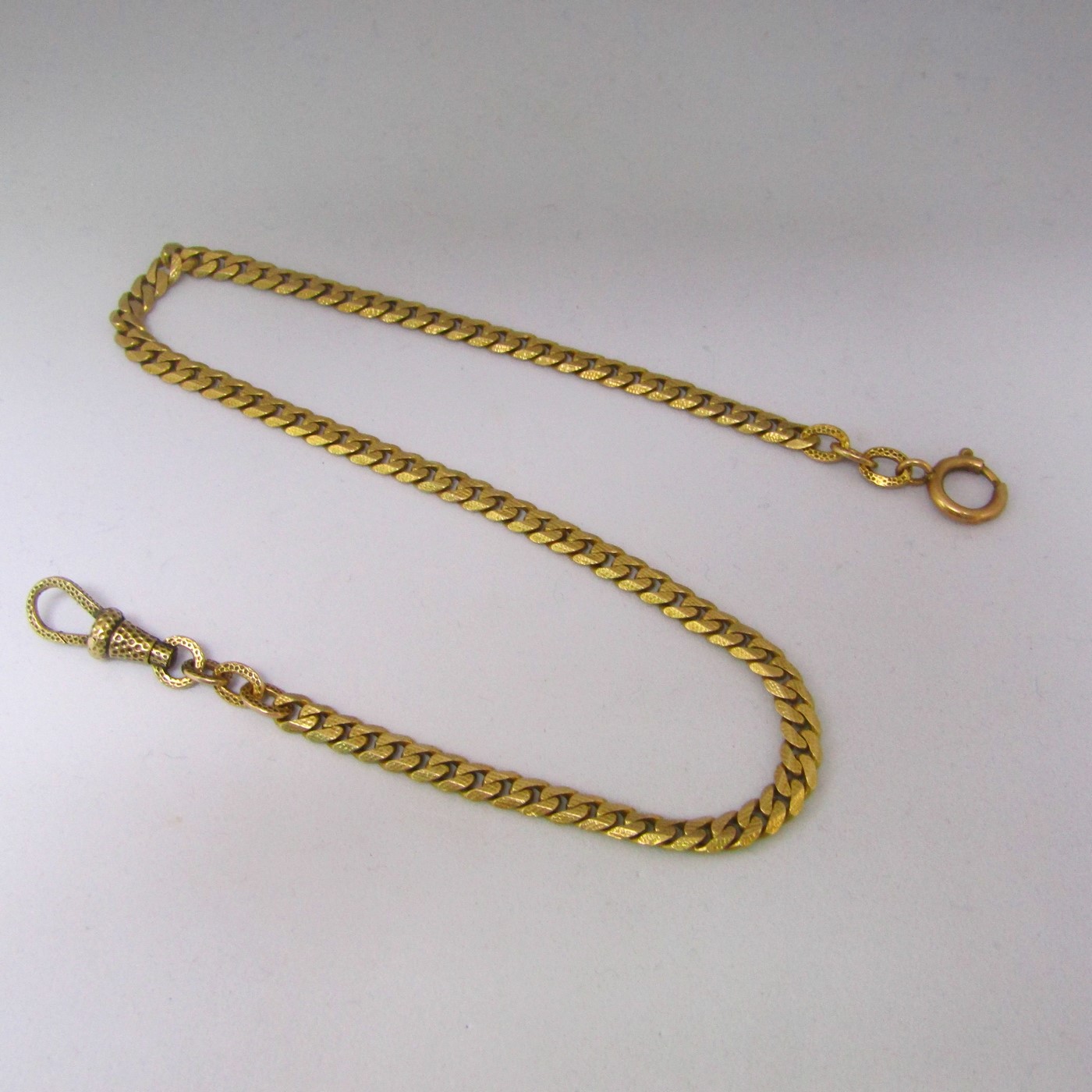 Leontina antigua. Terminal cadena para reloj de bolsillo. Oro 18k. 19,72 gr. Leontina antigua. Terminal cadena para reloj de bolsillo. Oro 18k. 19,72 gr.