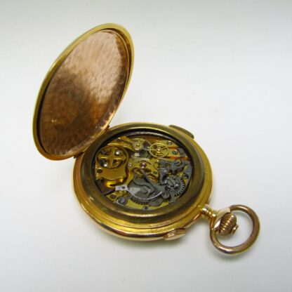 ANGELUS. Reloj de Bolsillo saboneta, remontoir, Cronógrafo y Repetición Horas y Cuartos. Oro 18k. Suiza, ca. 1910.