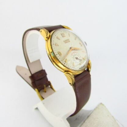 CAUNY PRIMA. Reloj de pulsera para mujer o cadete. Suiza. Ca.1950