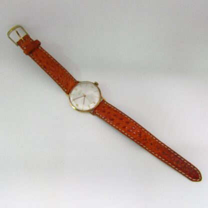 DOXA. Reloj de pulsera para caballero. Oro 14k. Suiza, ca.1950