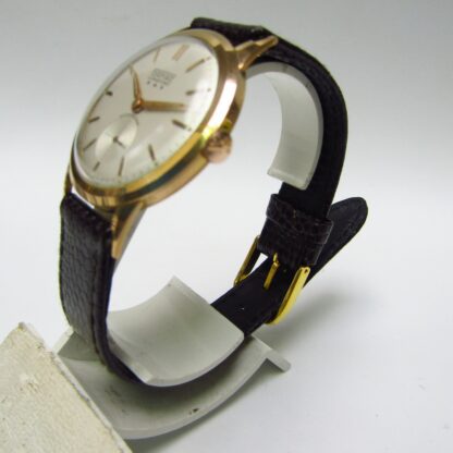 PONTIAC***. Montre-bracelet pour hommes. Or 18 carats. Suisse, env. 1955.