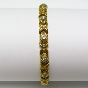 Pulsera de Oro de 18k con 14 Diamantes talla Brillante de 0,55 ct. (G-H/VS1-2). 21,20 gr.