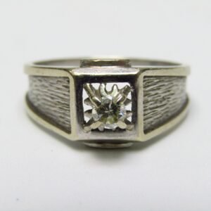 Solitario en Oro Blanco con Diamante Natural, talla Brillante de 0,20 ct. (G-VS1).