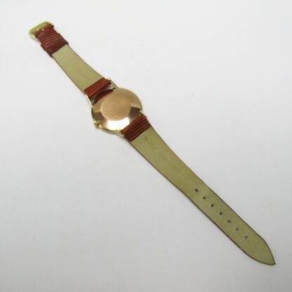 WYLER-VETTA. Montre-bracelet pour hommes. Or 18 carats. Suisse, env. 1960.