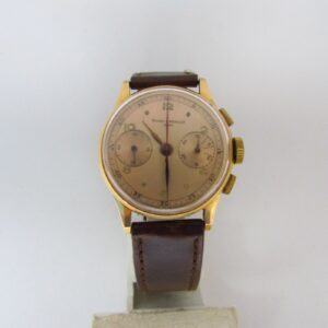BAUME AND MERCIER (GENEVE). Reloj Cronógrafo de pulsera para caballero. Oro 18k. Suiza, ca. 1950