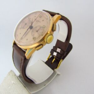 BAUME AND MERCIER (GENEVE). Reloj Cronógrafo de pulsera para caballero. Oro 18k. Suiza, ca. 1950