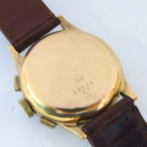 BAUME AND MERCIER (GENEVE). Reloj Cronógrafo de pulsera para caballero. Oro 18k. Suiza, ca. 1950