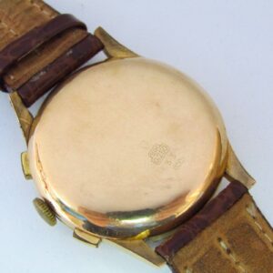 CHRONOGRAPHE SUISSE. Reloj Cronógrafo de pulsera. Oro 18k. Ca. 1950