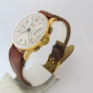 Monsegur. Reloj Cronógrafo de pulsera para caballero. Oro 18k. Ca. 1950