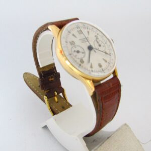 Monsegur. Reloj Cronógrafo de pulsera para caballero. Oro 18k. Ca. 1950