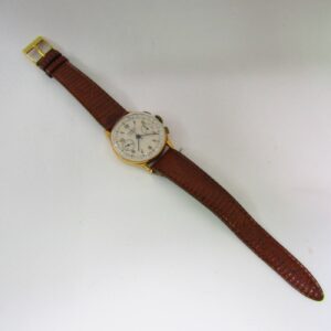 Monsegur. Reloj Cronógrafo de pulsera para caballero. Oro 18k. Ca. 1950