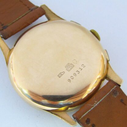 Olympic Cronographe. Reloj Cronógrafo de caballero. Oro 18k. Circa. 1950.