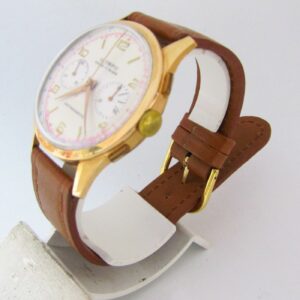 Olympic Cronographe. Reloj Cronógrafo de caballero. Oro 18k. Circa. 1950.