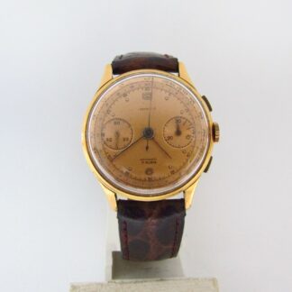 OLYMPIC. Reloj Cronógrafo de pulsera para caballero. Oro 18k. Suiza, ca. 1950.
