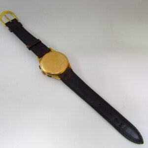 OLYMPIC. Reloj Cronógrafo de pulsera para caballero. Oro 18k. Suiza, ca. 1950.
