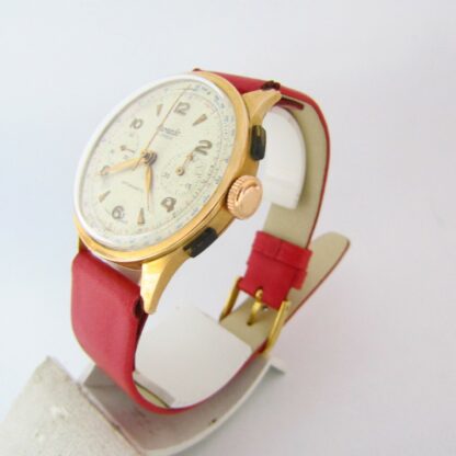 Reloj Cronógrafo de pulsera para caballero. Marca CORANIC. Oro 18k. Suiza, Ca. 1950