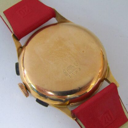 Montre-bracelet chronographe pour homme. Marque CORANIC. Or 18 carats. Suisse, vers 1950